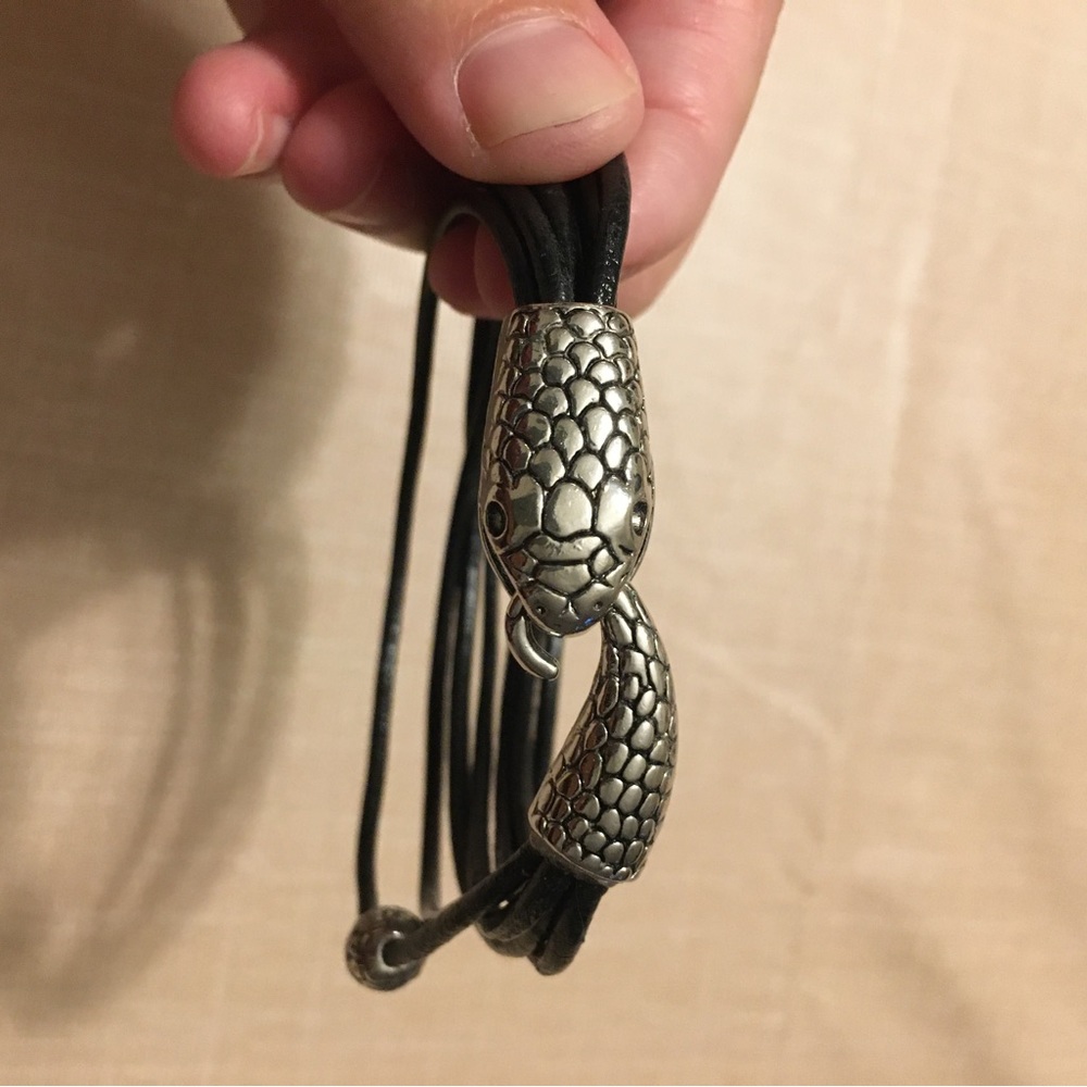 A leather cord crocodile bracelet